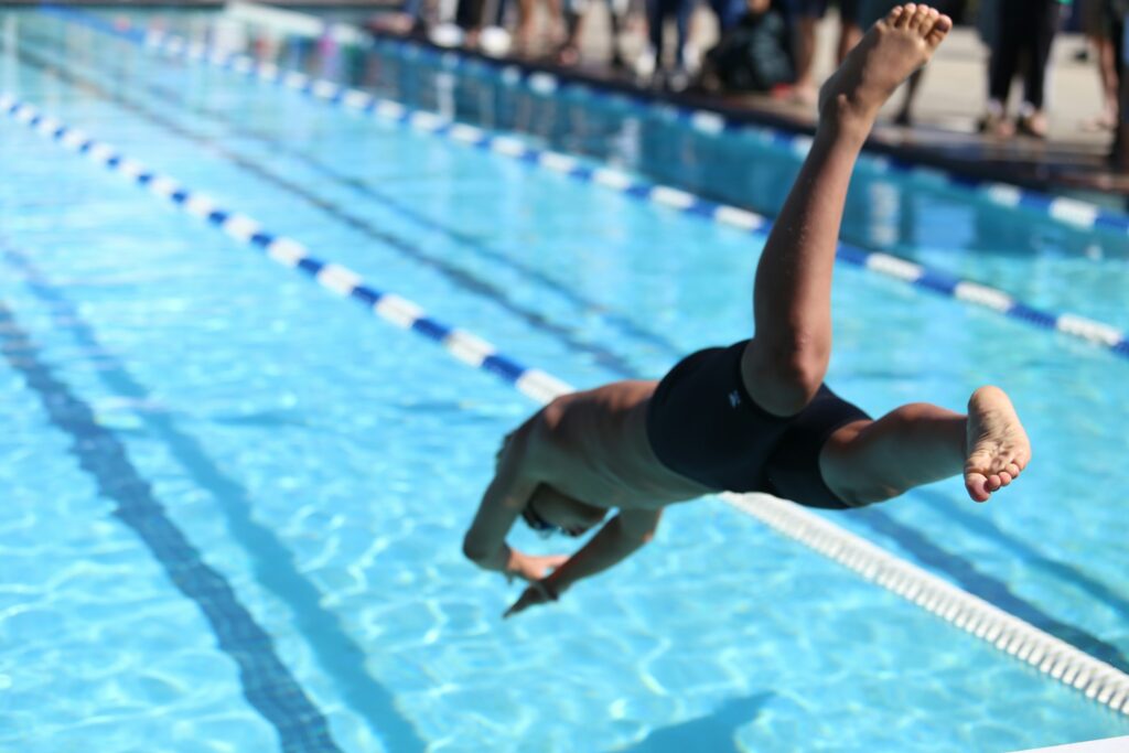 jumping-in-the-pool-to-swim